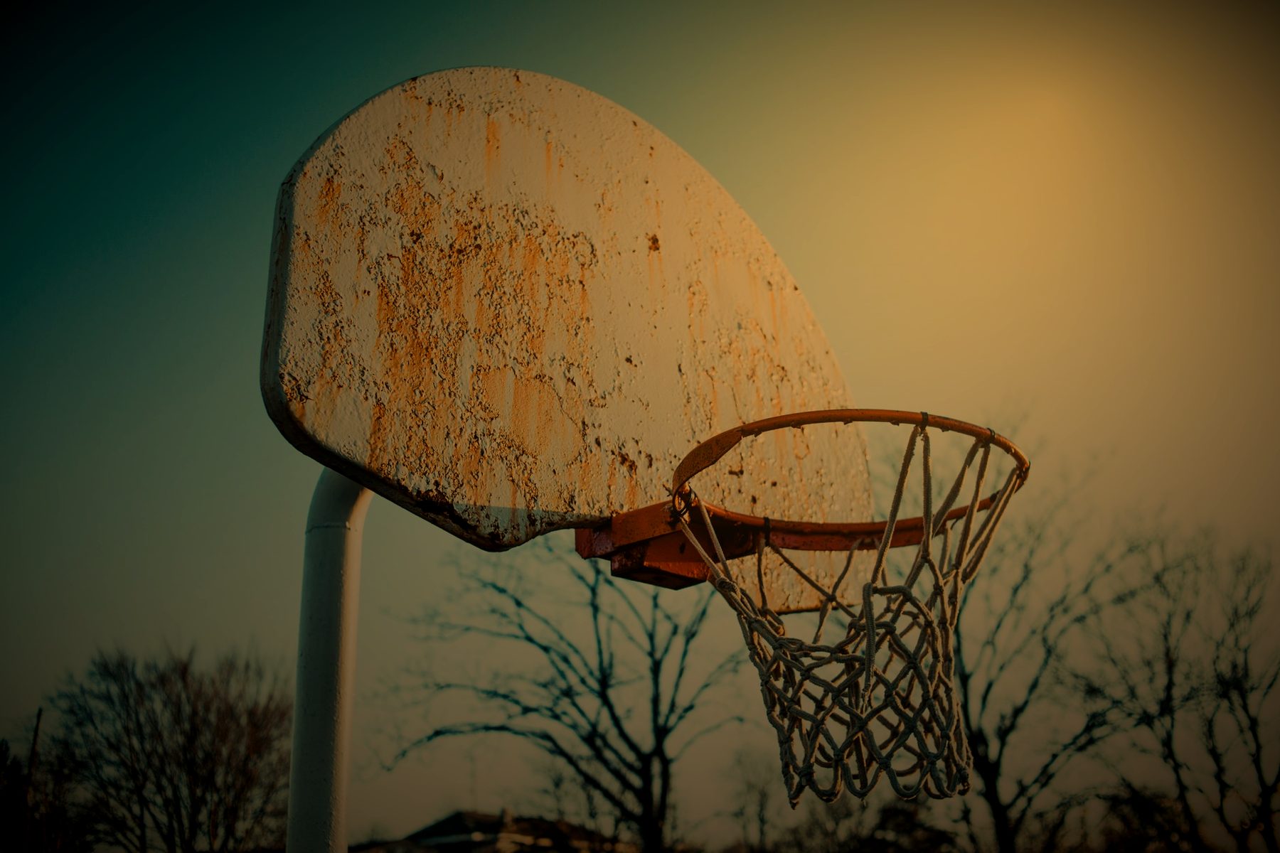 Weathered outdoor backboard and rim